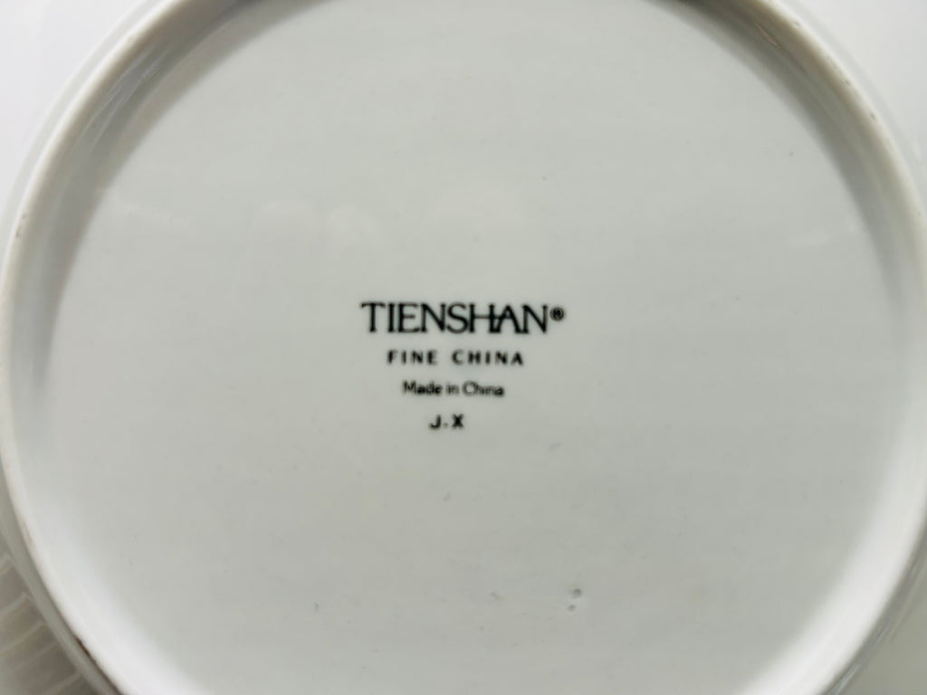 Tienshan Fine China logo on a white plate